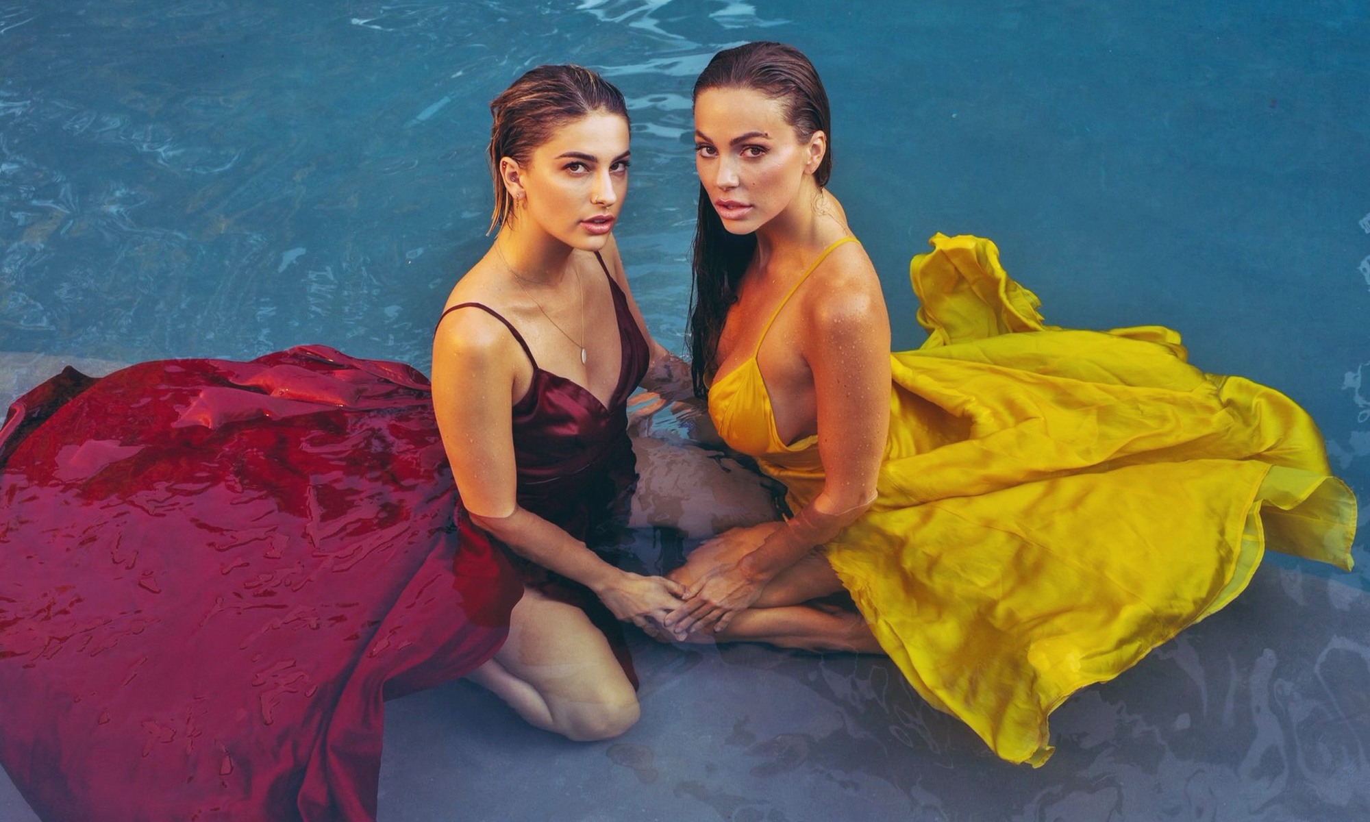 Abigail Mac at 37 Years Old and Kristen Scott at 30 Years Old as Erotic Centerfold Fashion Models Reddish and Golden Bright Saten Dress on Pool (2025)