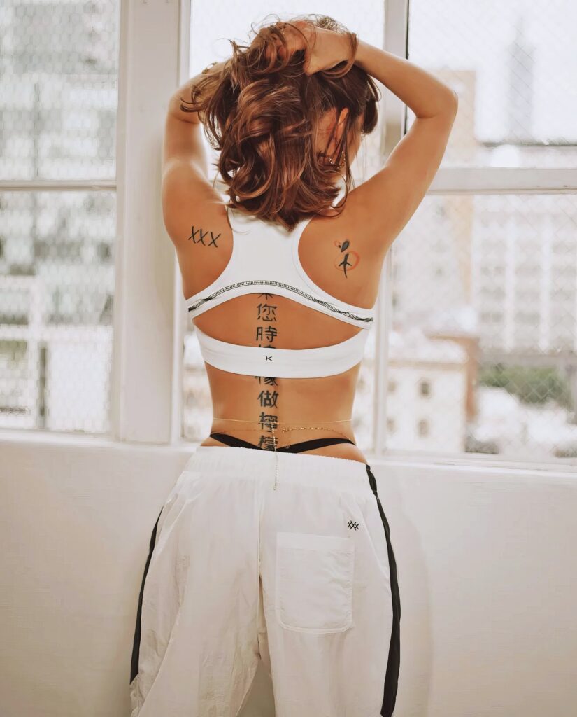 Riley Reid at 33 Years Old: Eighteen Plus Clothing (2024) Fashionista Model Back tattoo