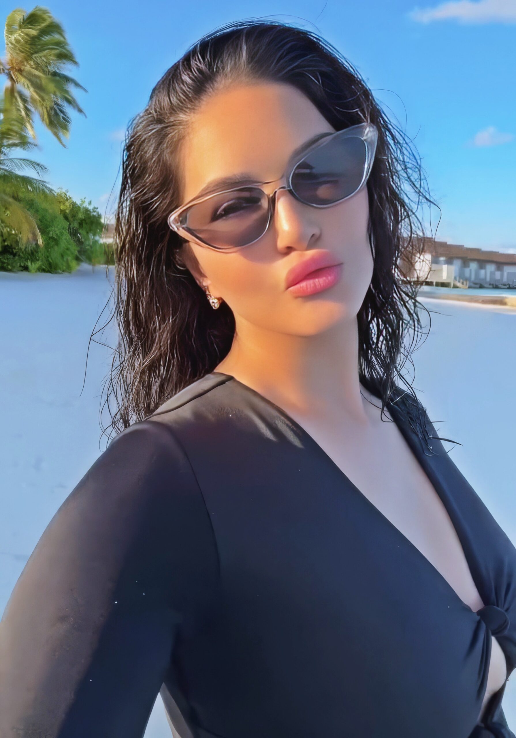 Sunny Leone at 43 Years Old as Erotic Centerfold Model and Bollywood India Star (2024) Black Bodysuitswim Beach MILF Brunette Busty