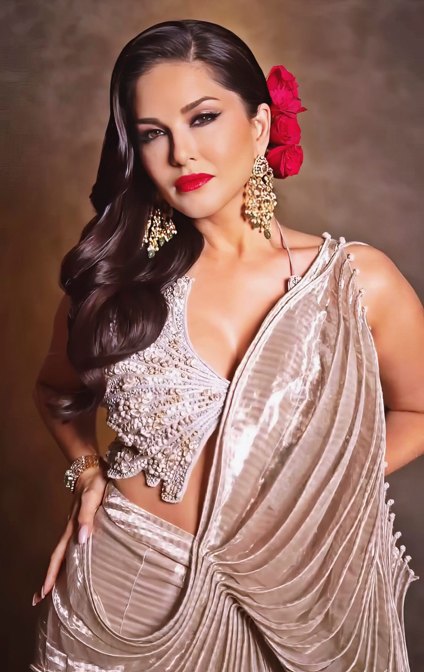 Sunny Leone at 43 Years Old as Erotic Centerfold Model and Bollywood India Star (2024) Luxure Bright Beige Dress Red Lips
