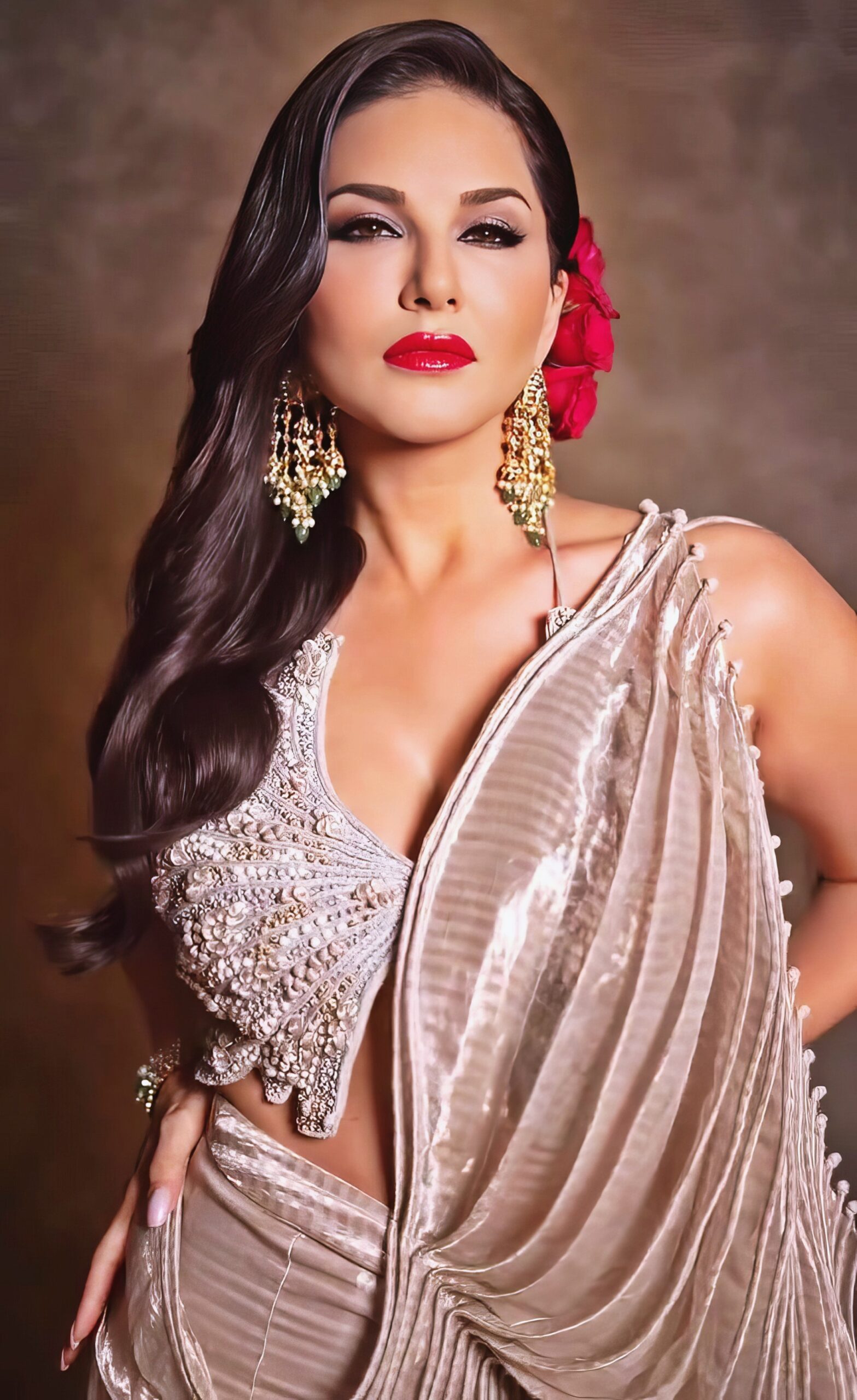 Sunny Leone at 43 Years Old as Erotic Centerfold Model and Bollywood India Star (2024) Luxure Bright Beige Dress Red Lips