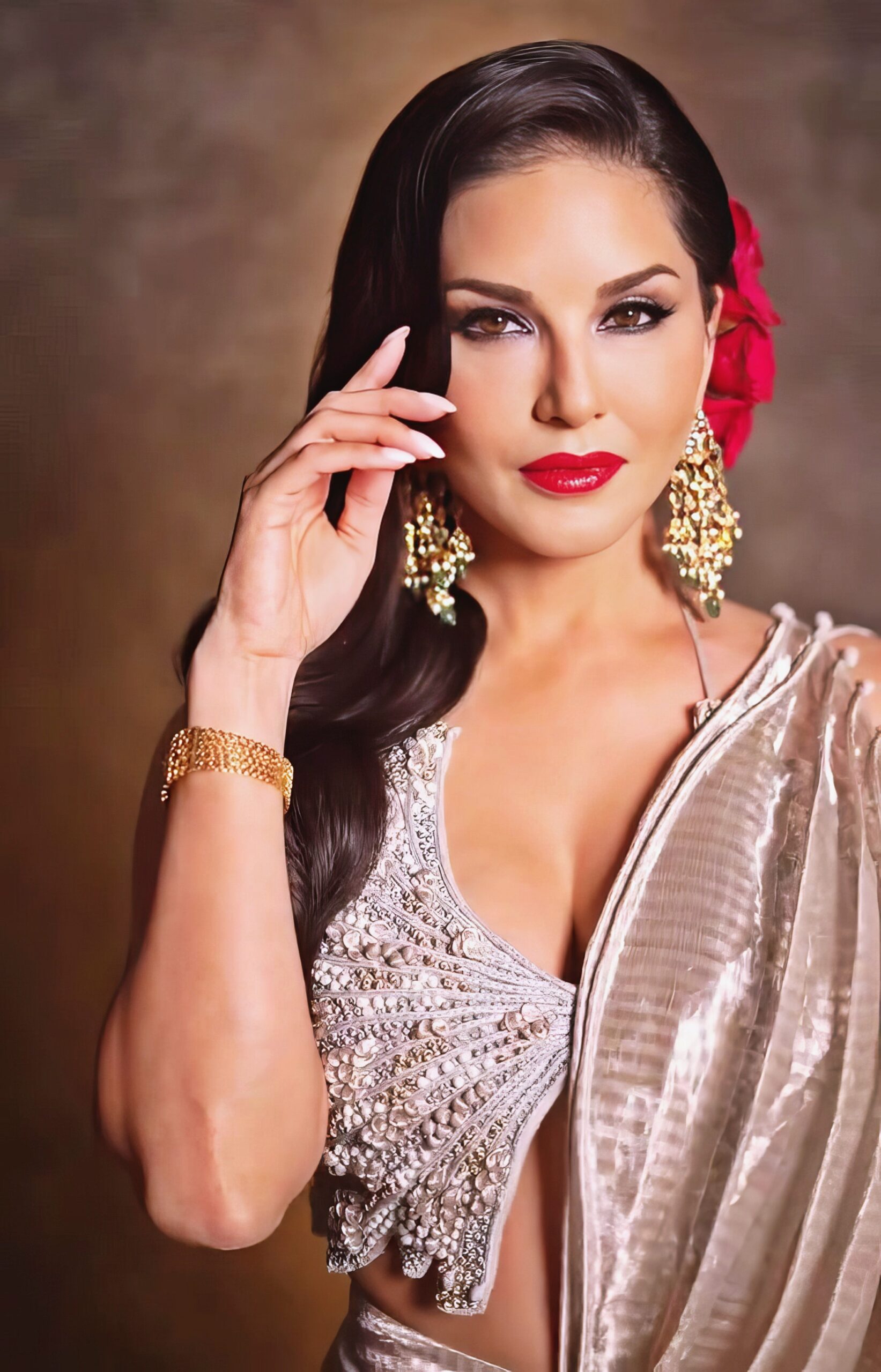 Sunny Leone at 43 Years Old as Erotic Centerfold Model and Bollywood India Star (2024) Luxure Bright Beige Dress Red Lips